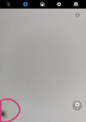 手机摄像头出现斑点的原因是什么？