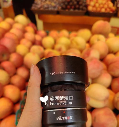 佳能小痰盂怎么拿相机镜头？正确的握持方式是什么？